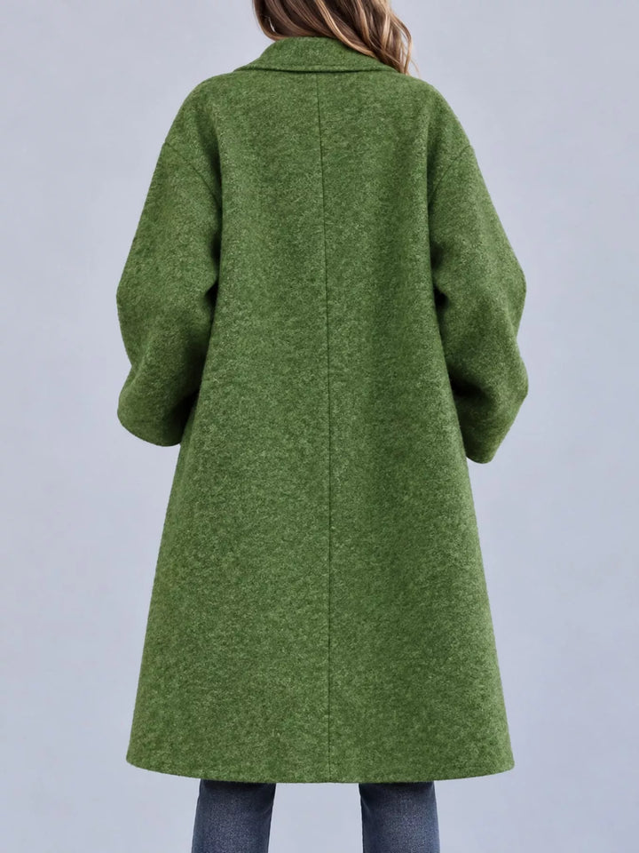 Oversized lapel one button longline in dark green, back view