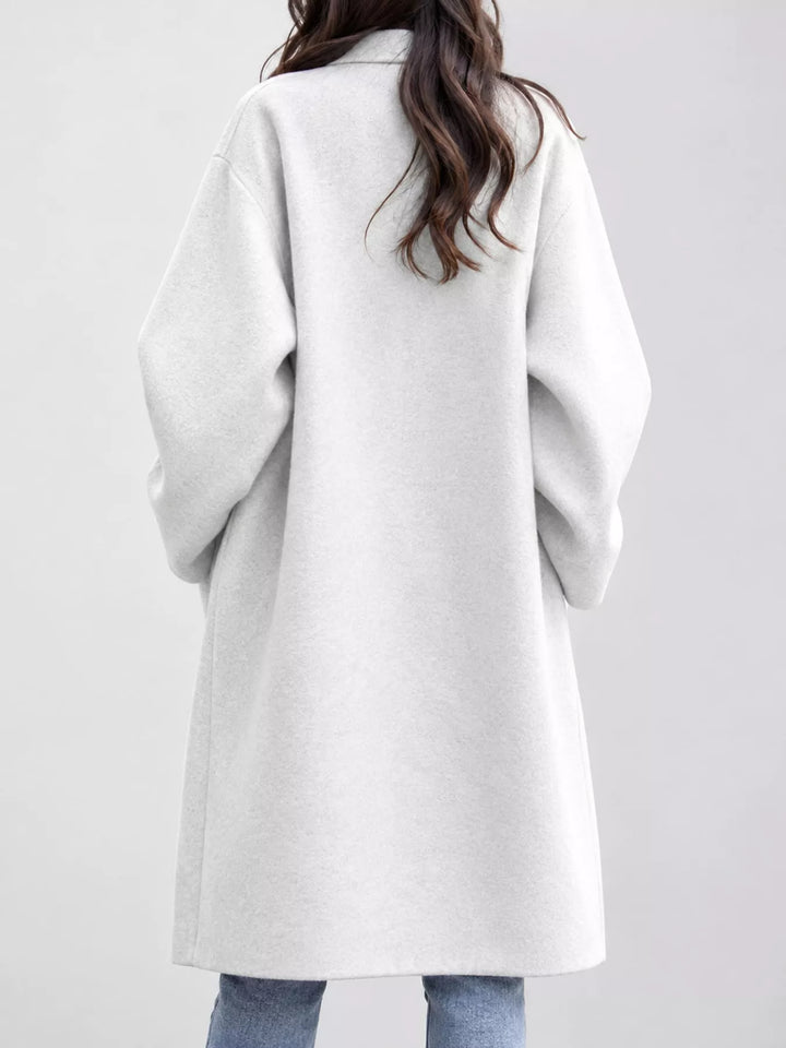 Oversized lapel one button longline in white, back view