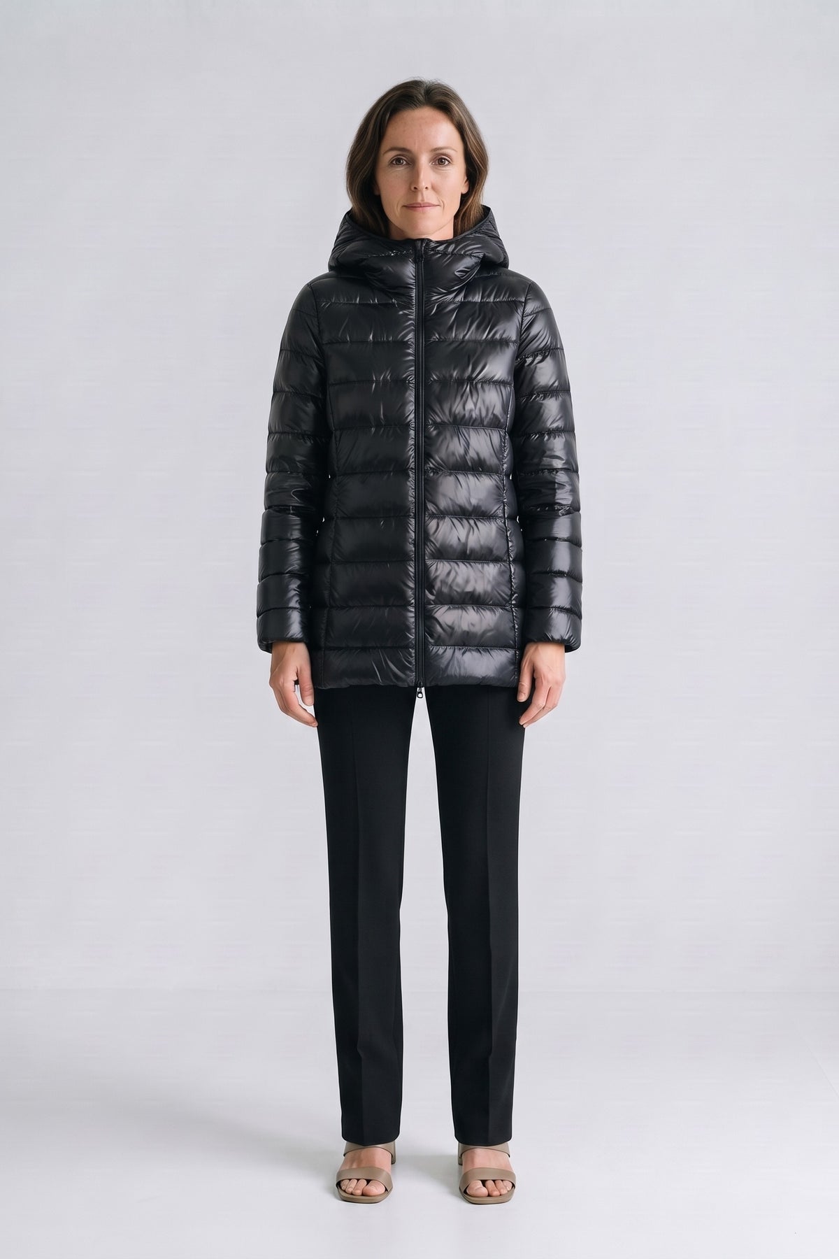 Women's Long Puffer Jacket | Hooded — Black — front view — on model