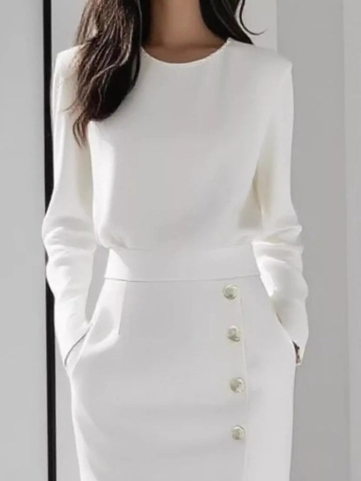 Round neck side button slit pockets in white, close-up detail