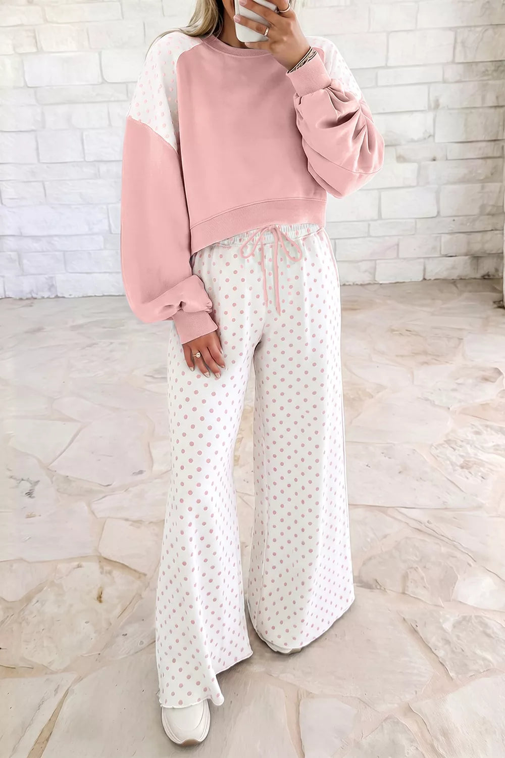 Women's lounge set in blush, cropped sweatshirt with polka dot pants, front view