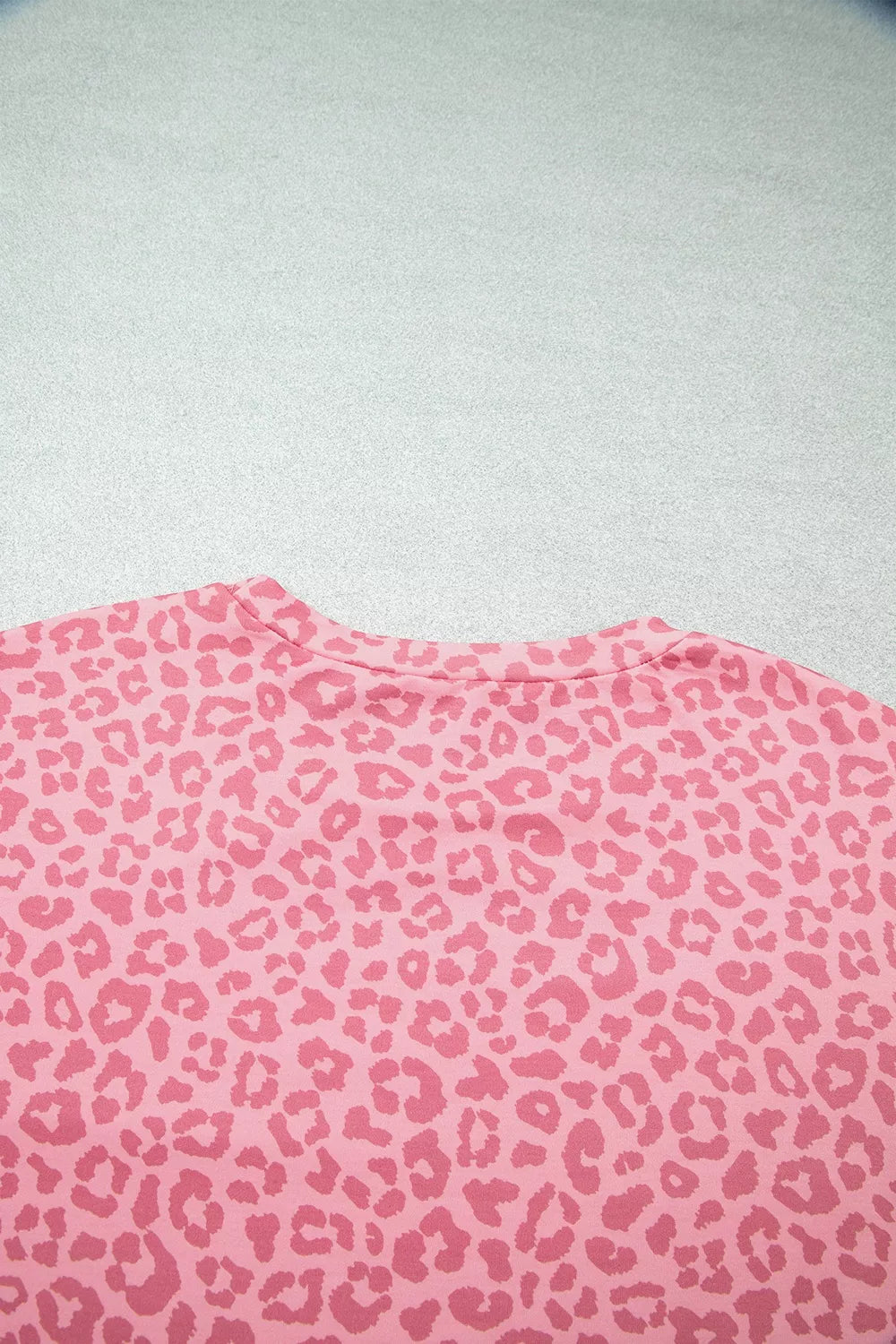 Pink leopard print top chest area with soft fabric texture