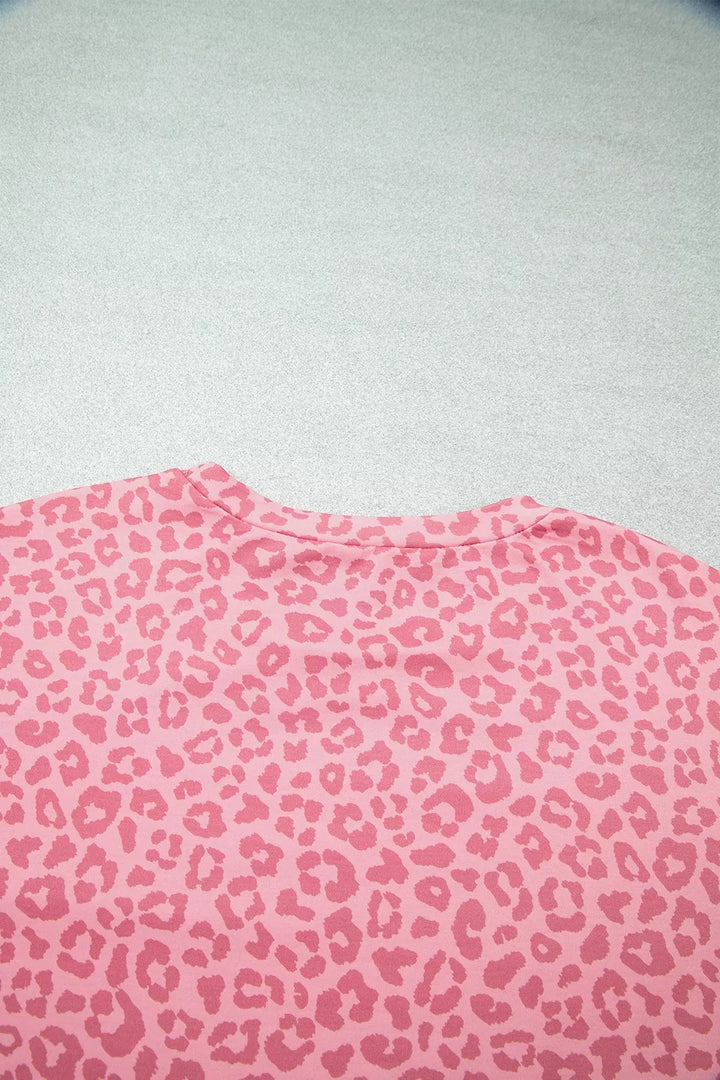 Pink leopard print top chest area with soft fabric texture