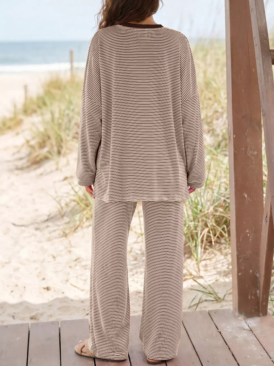 Back view of the mocha oversized top and wide leg pants