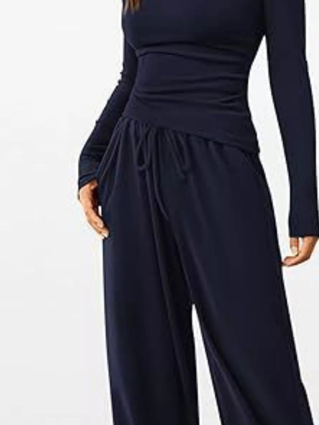 Navy ribbed ruched top and drawstring waistband, close torso view