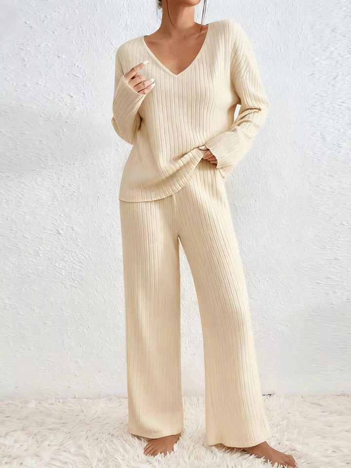 Cream ribbed knit lounge set with v neck top and wide leg pants