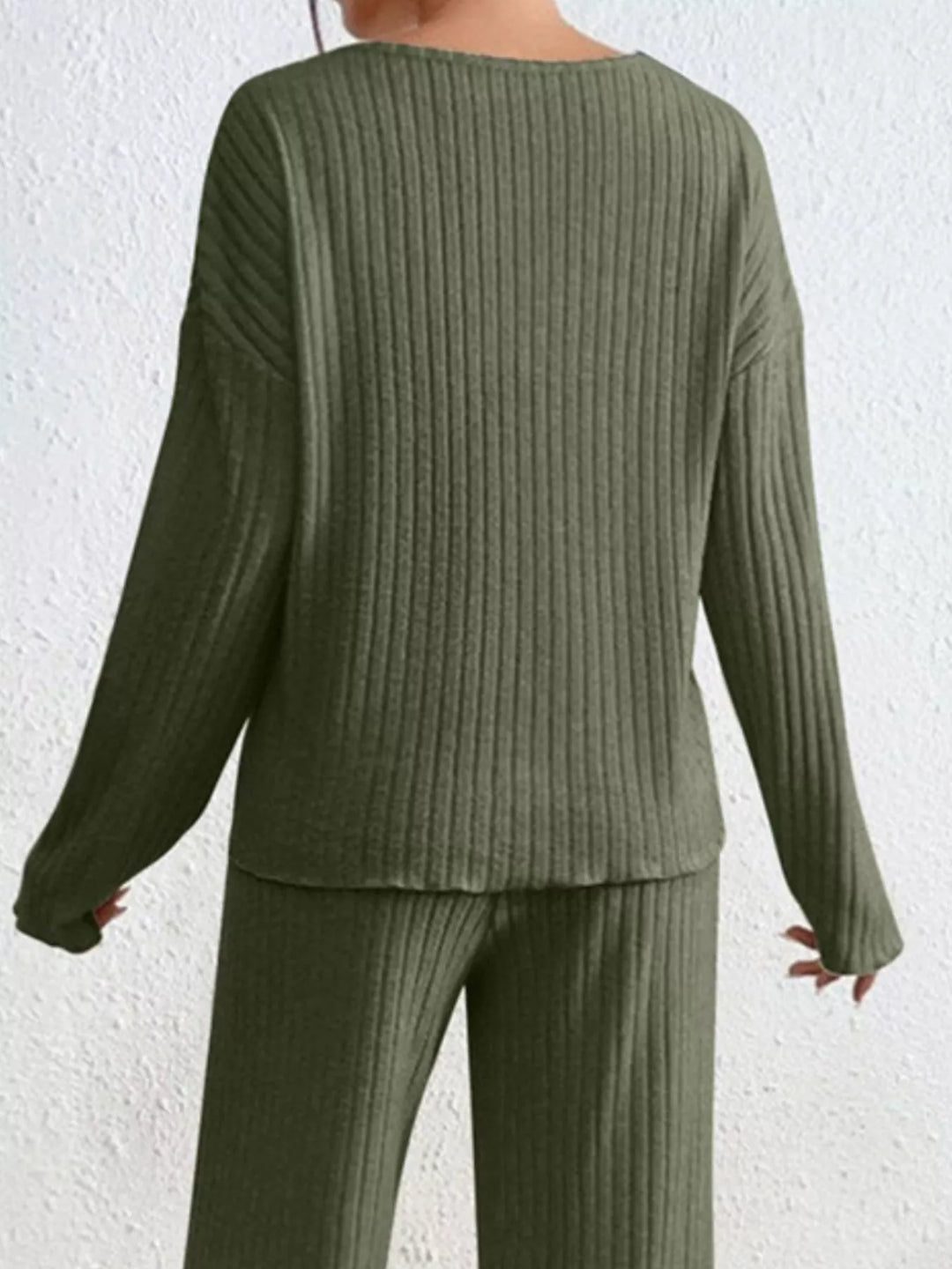 Back view of the olive ribbed knit v neck top and pants