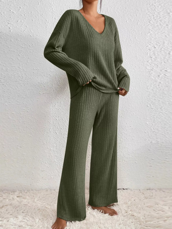 Olive v neck ribbed lounge set, side angle with sleeves relaxed