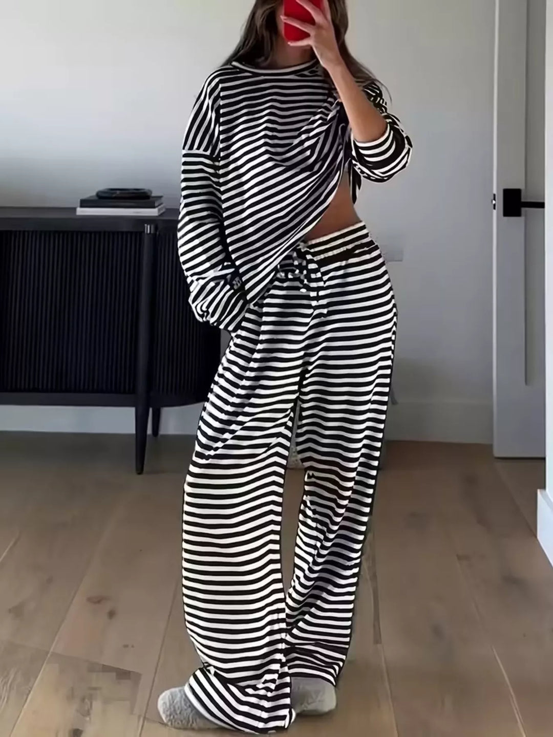 Black and white striped lounge set, full length, taken in a mirror