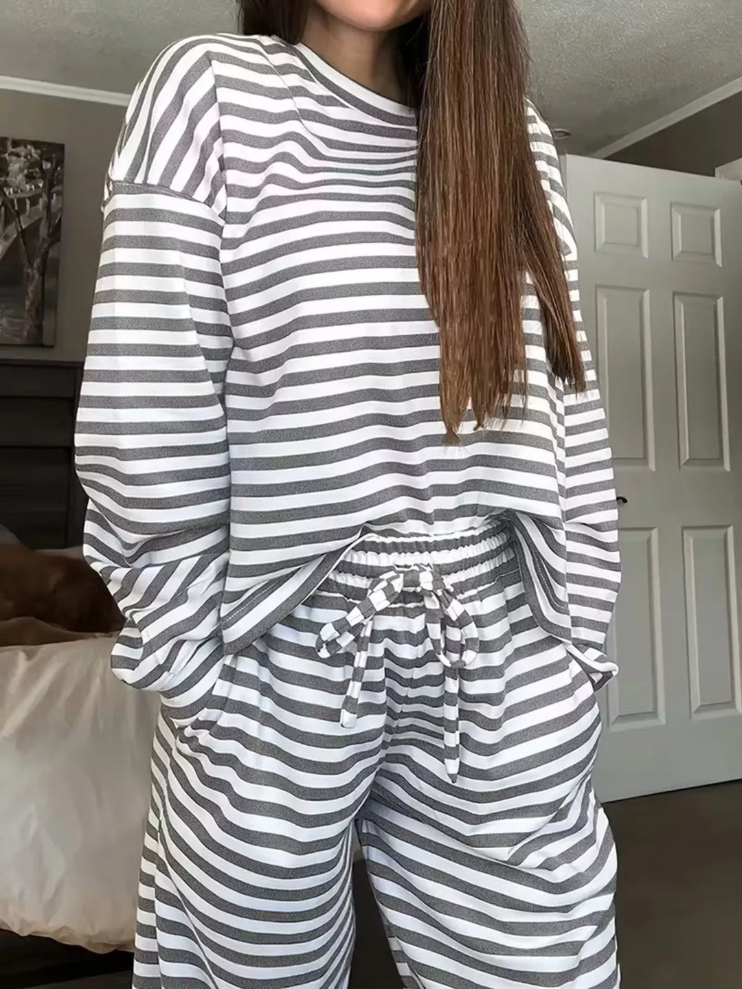 Women's lounge set in gray stripes, long sleeve top and drawstring pants, front view