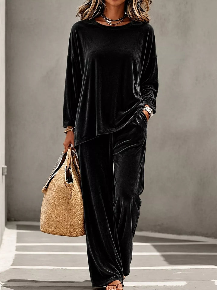 Black velvet lounge set with wide leg pants, full length street style