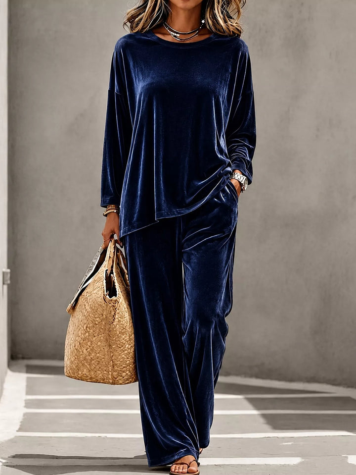 Navy velvet lounge set with wide leg pants, full length walking pose