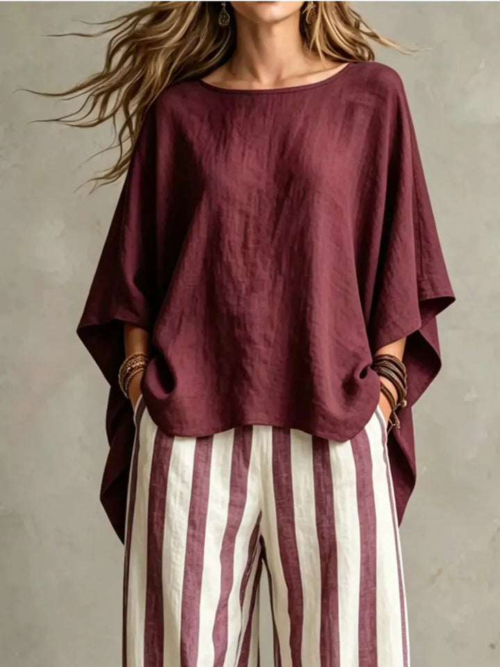 Burgundy matching set top with wide batwing sleeves, closer front view