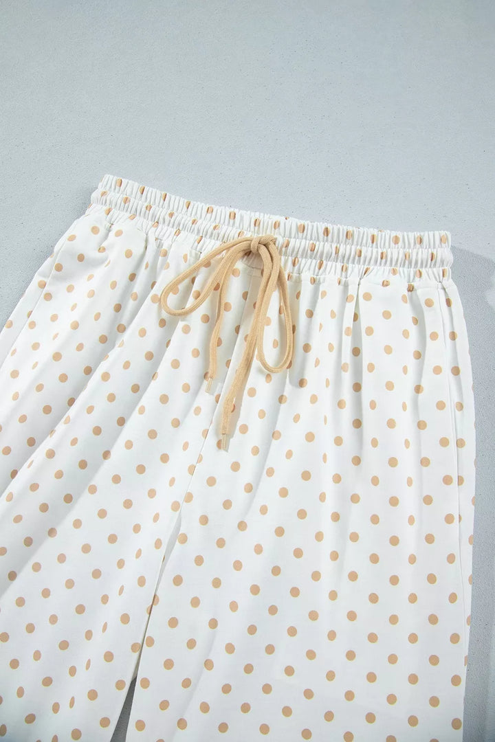 Drawstring waist of the polka dot wide leg pants, close-up
