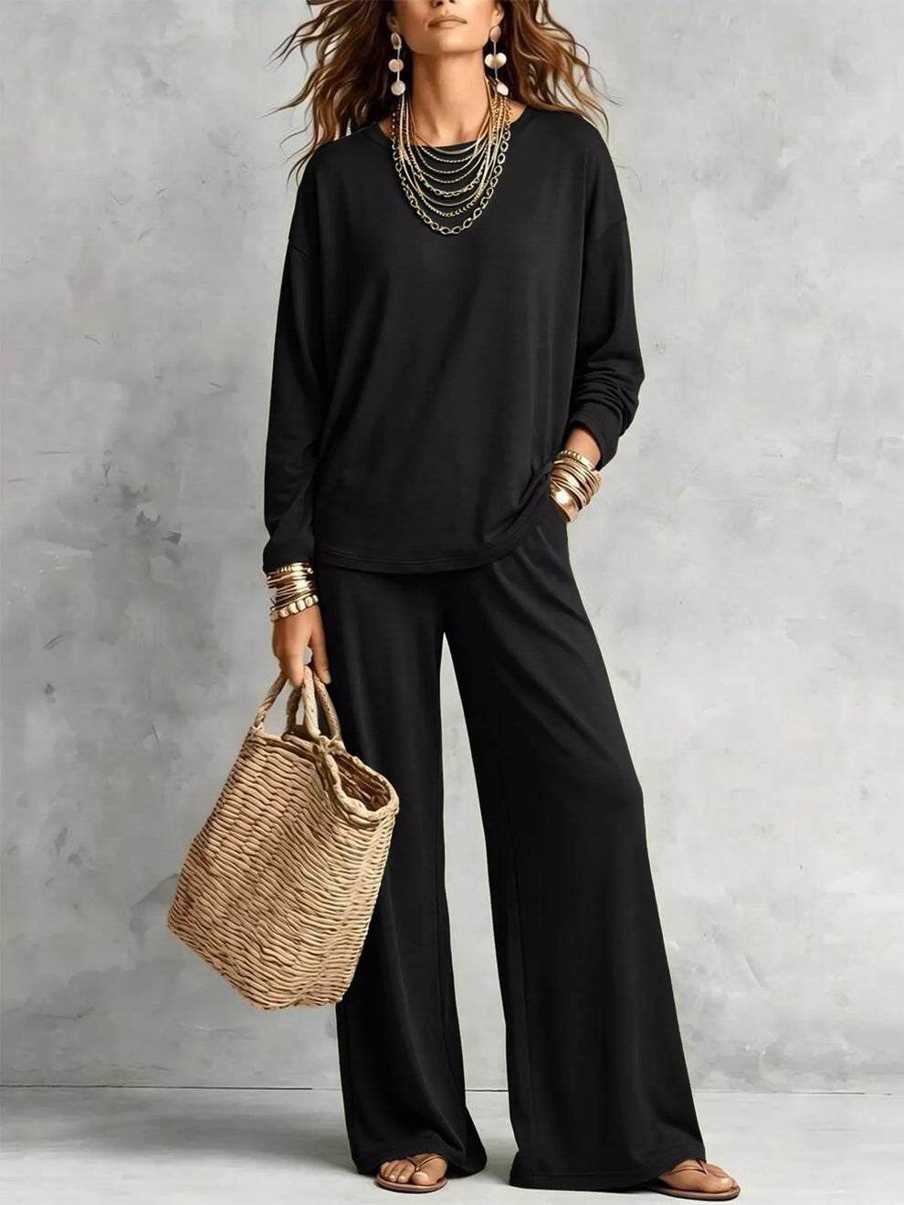 Black long sleeve tee and wide leg pants set with a woven tote