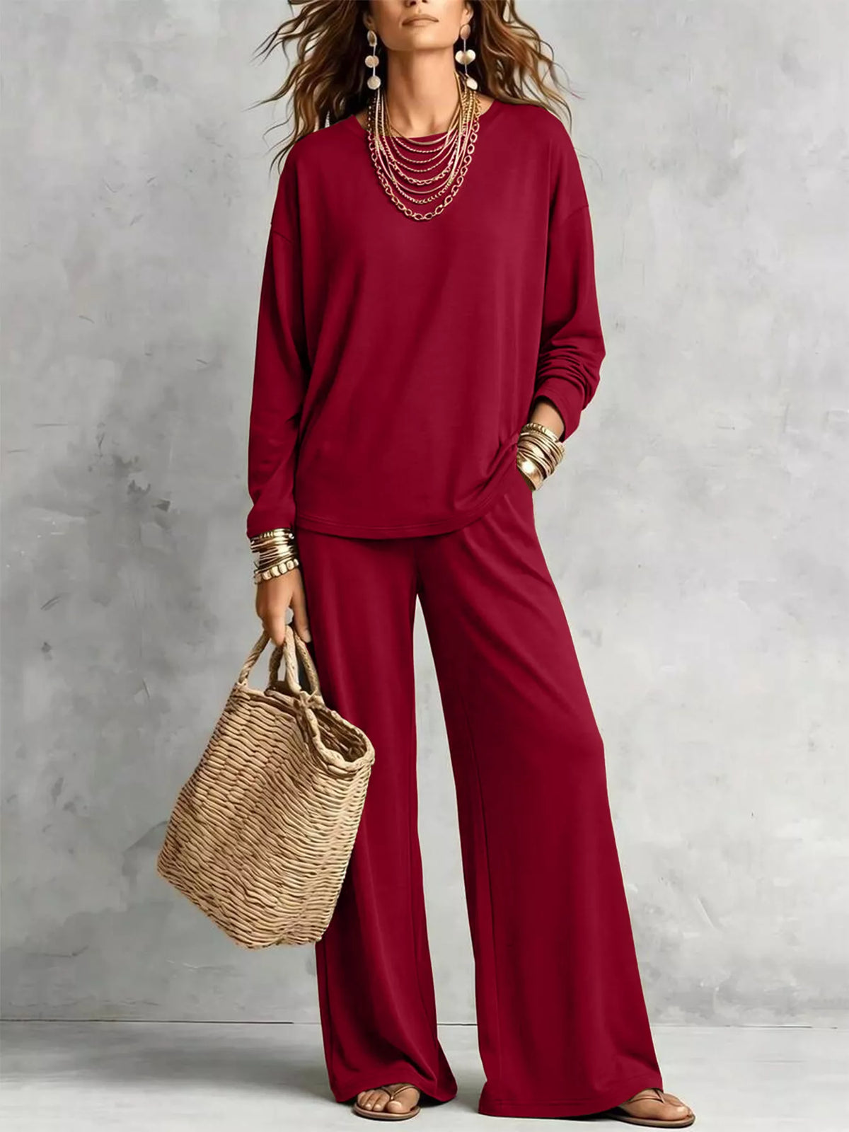 Burgundy tee and wide leg pants styled with a straw tote bag