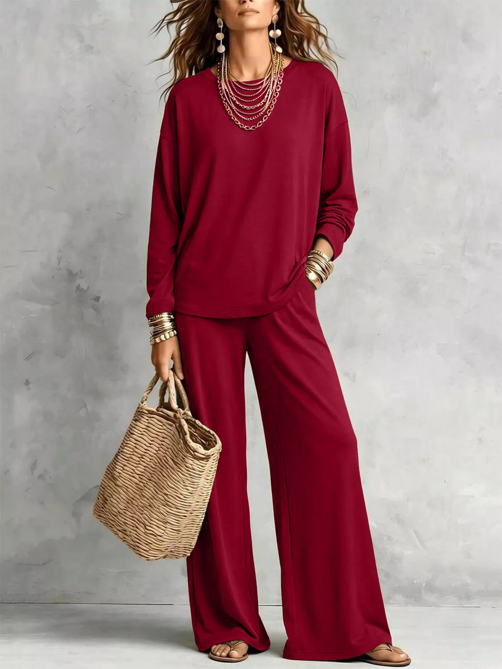 Burgundy tee and wide leg pants styled with a straw tote bag