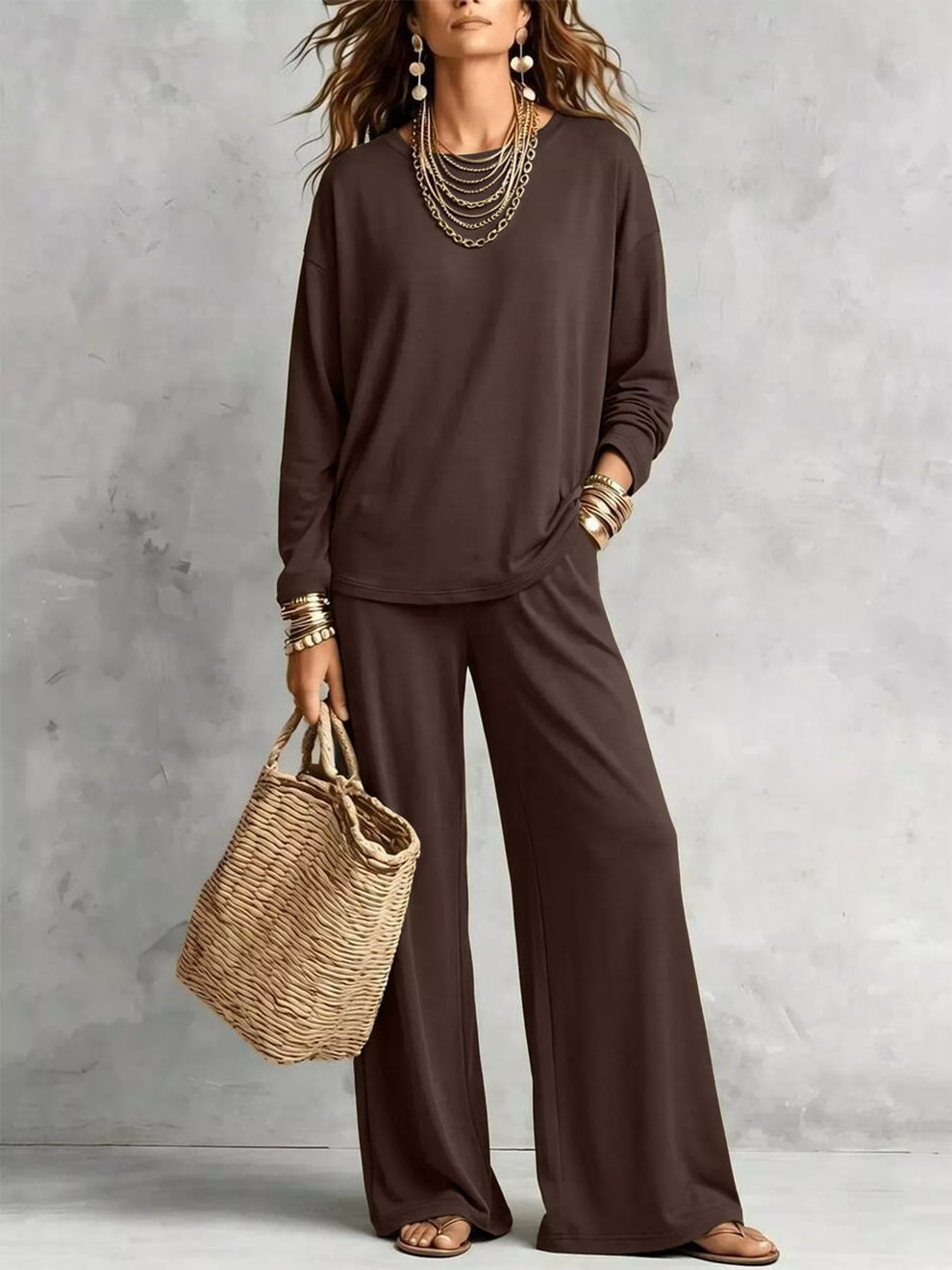 Chocolate brown long sleeve tee and wide leg pants with a straw tote