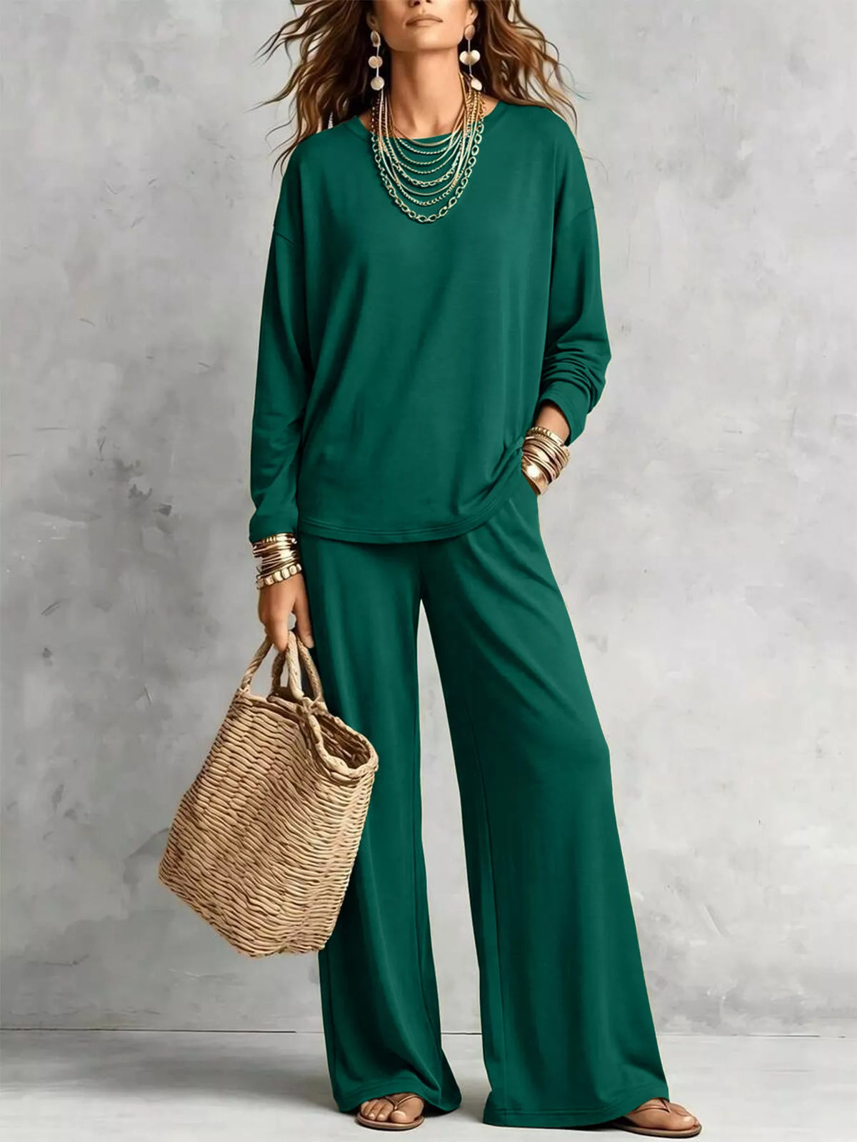 Emerald green matching set with a woven bag, full length view