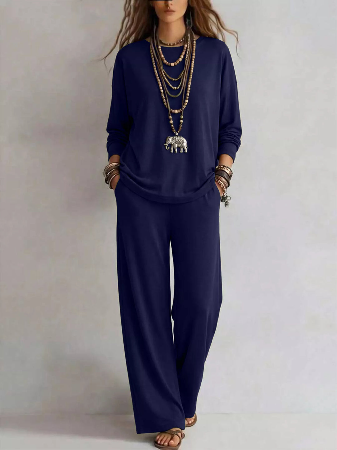 Navy matching set with layered necklaces, standing front view