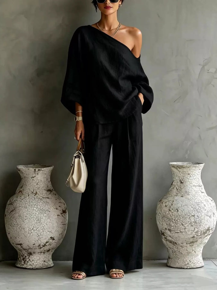 Black one shoulder top and wide leg pants set, full-length view