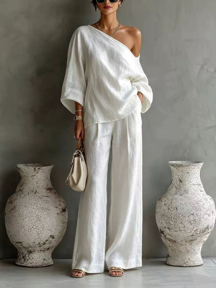 Women's matching set in white, one shoulder top and wide leg pants