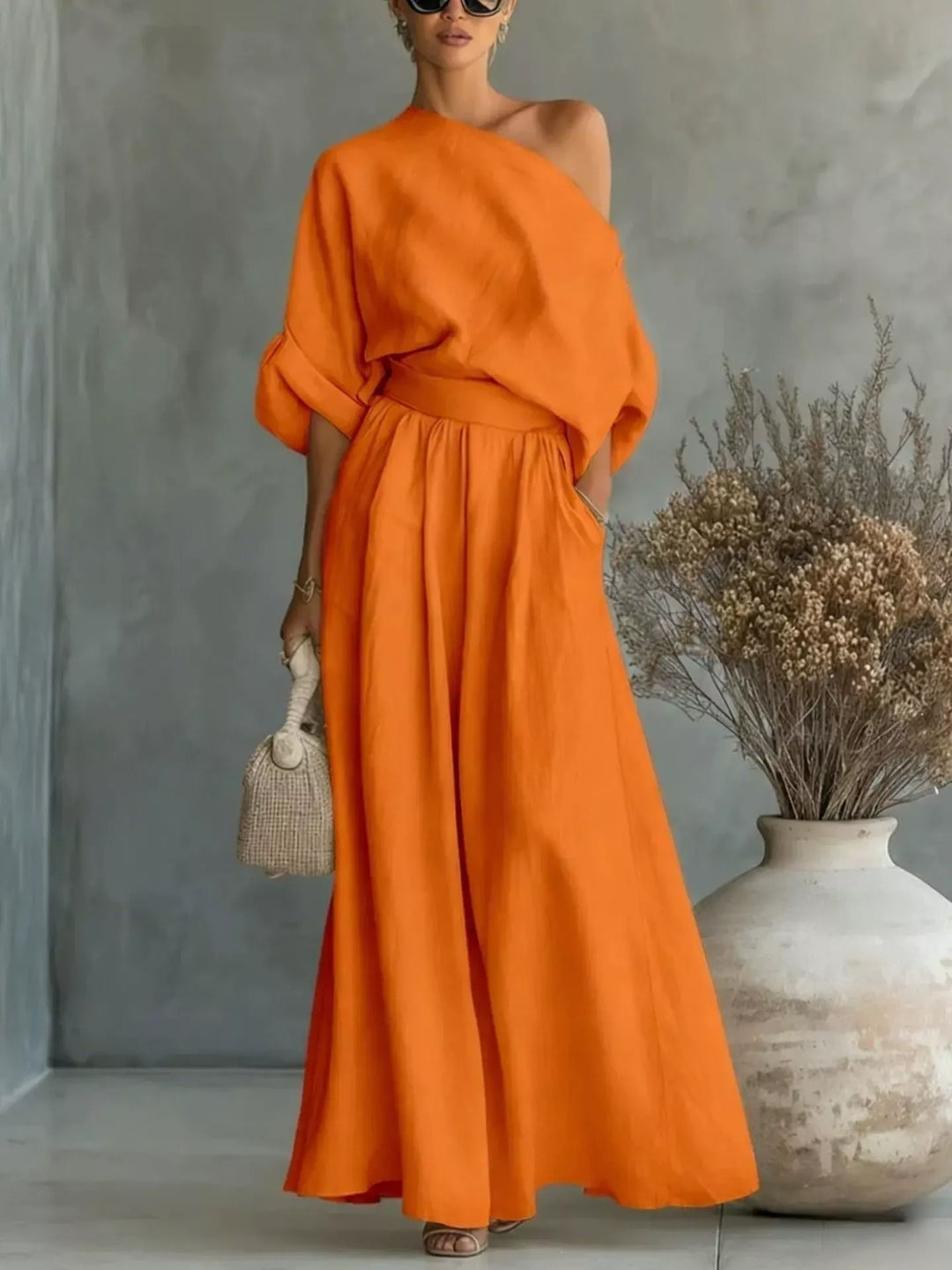 Orange one shoulder matching set with wide leg maxi pants, full length