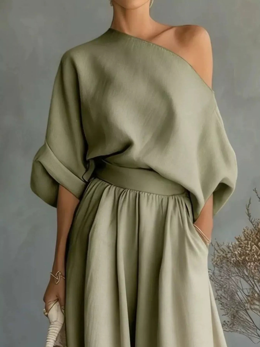 Closer view of the sage one shoulder top and waistband