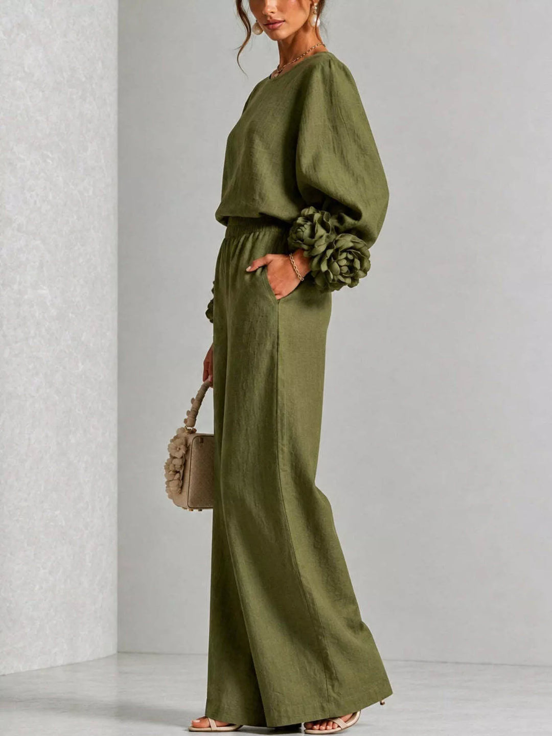 Side view of the moss matching set with a hand in the pocket