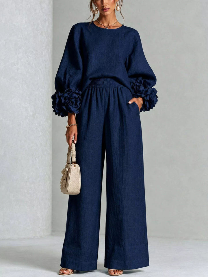Navy matching set with puff sleeve top and wide leg pants, front view