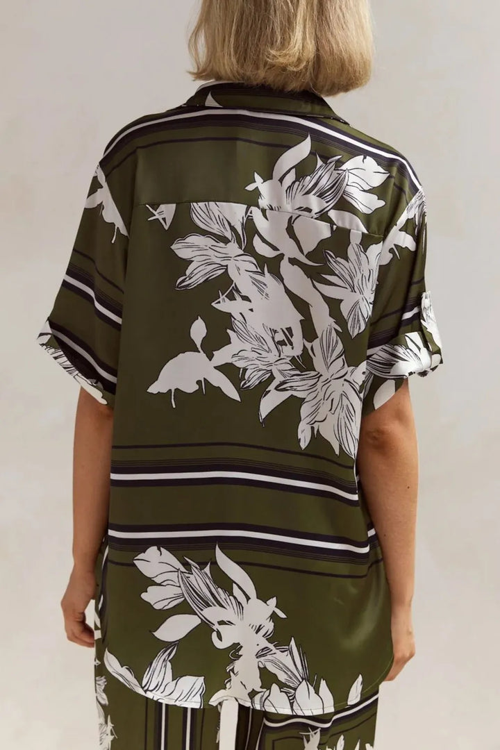 Back view of the olive floral button up shirt with leaf print