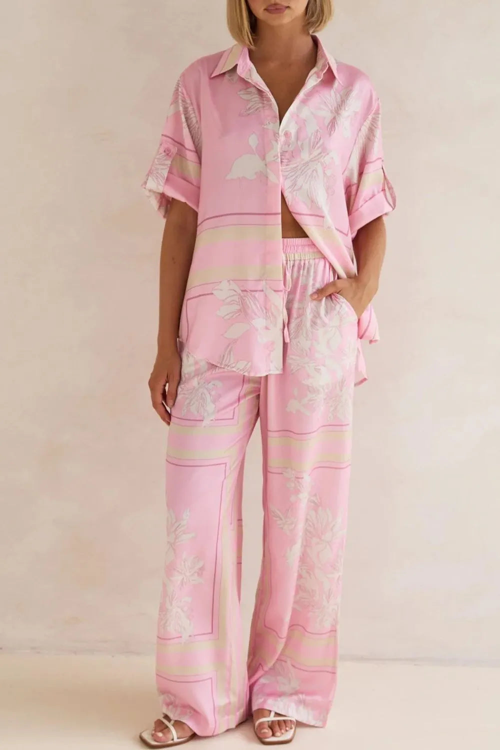 Pink floral matching set with button up shirt and pants, front view