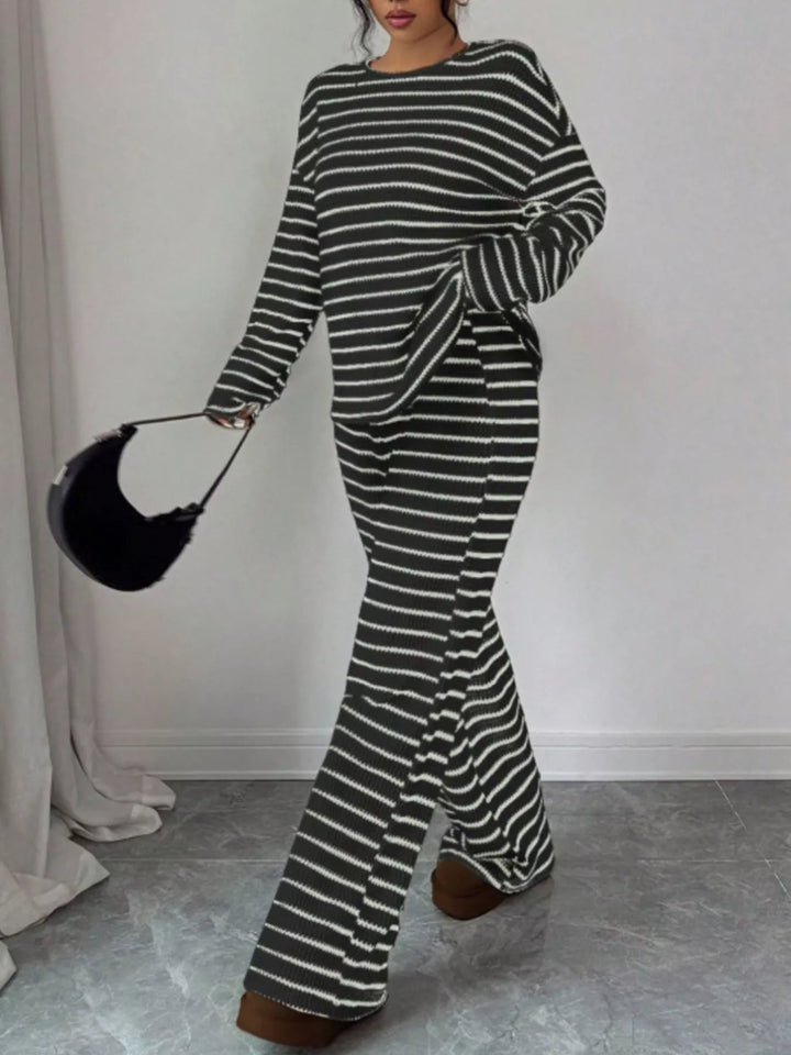 Striped waffle knit top and wide leg pants in black, styled on model