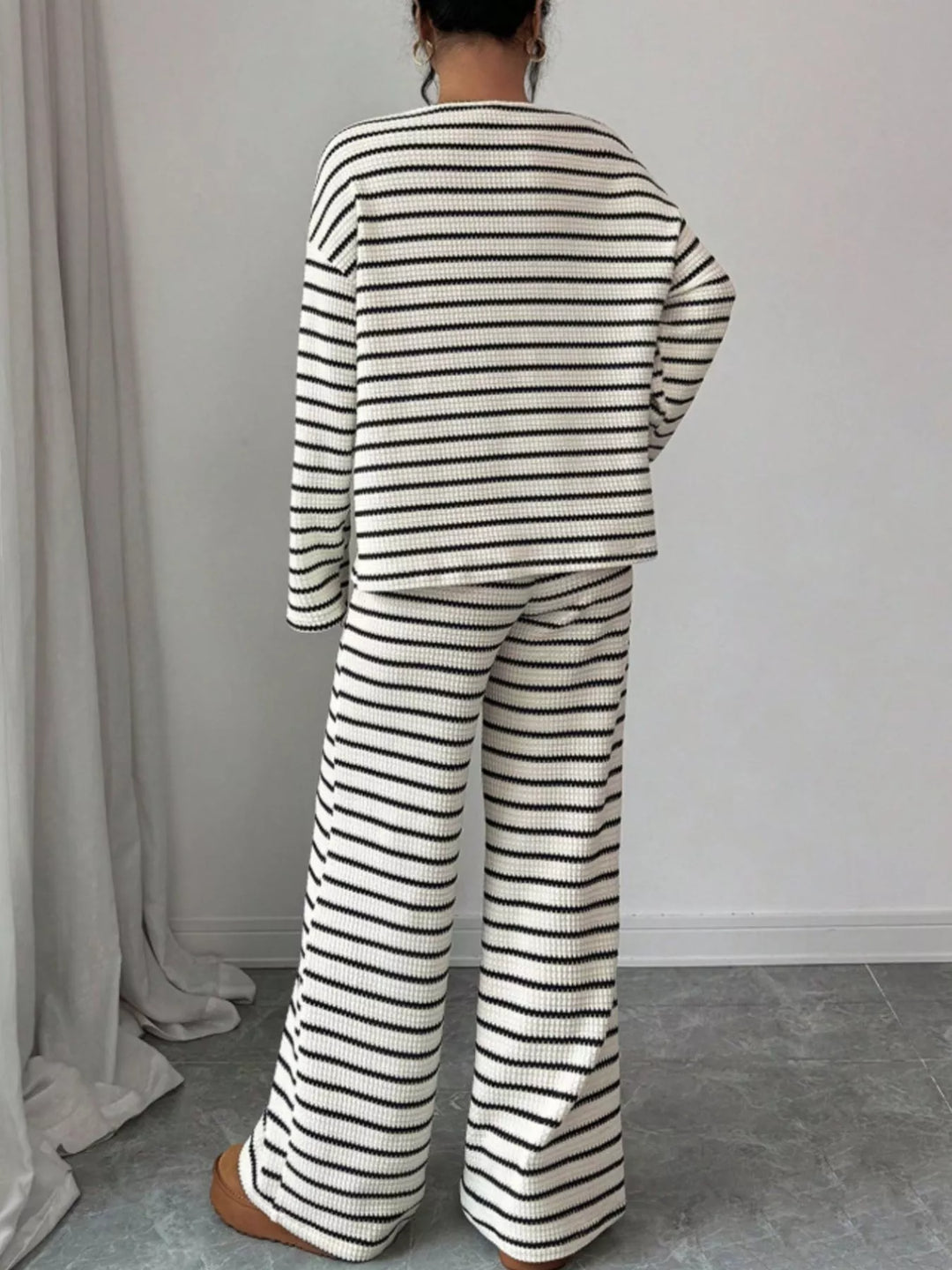 Striped waffle knit top and wide leg pants in white, back view