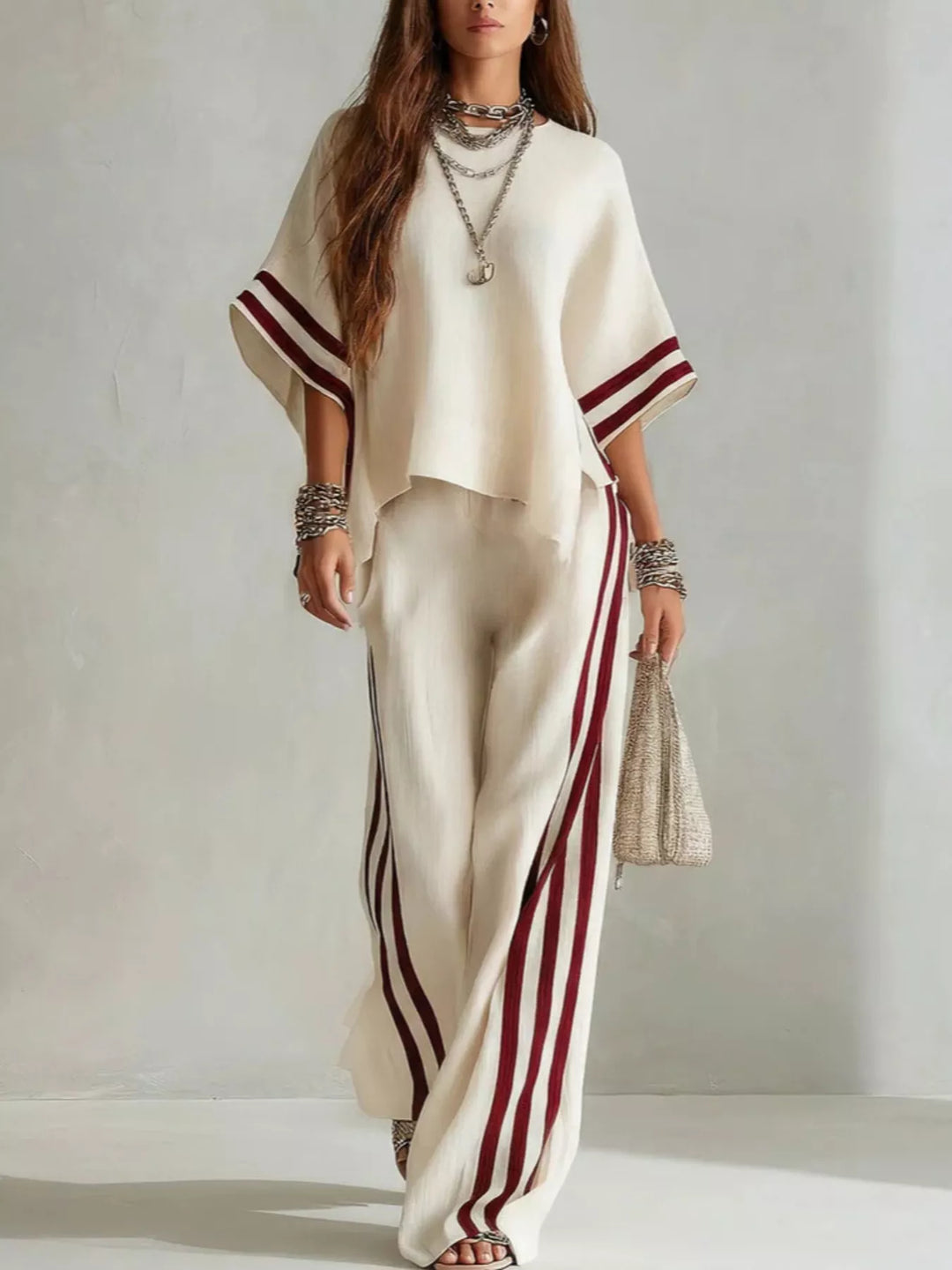 Cream matching set with burgundy striped sleeves and wide leg striped pants