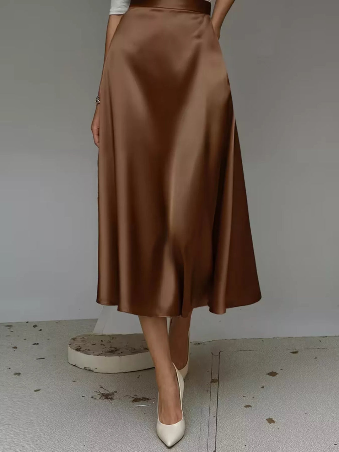 Back view of the chocolate brown high waisted satin look midi skirt
