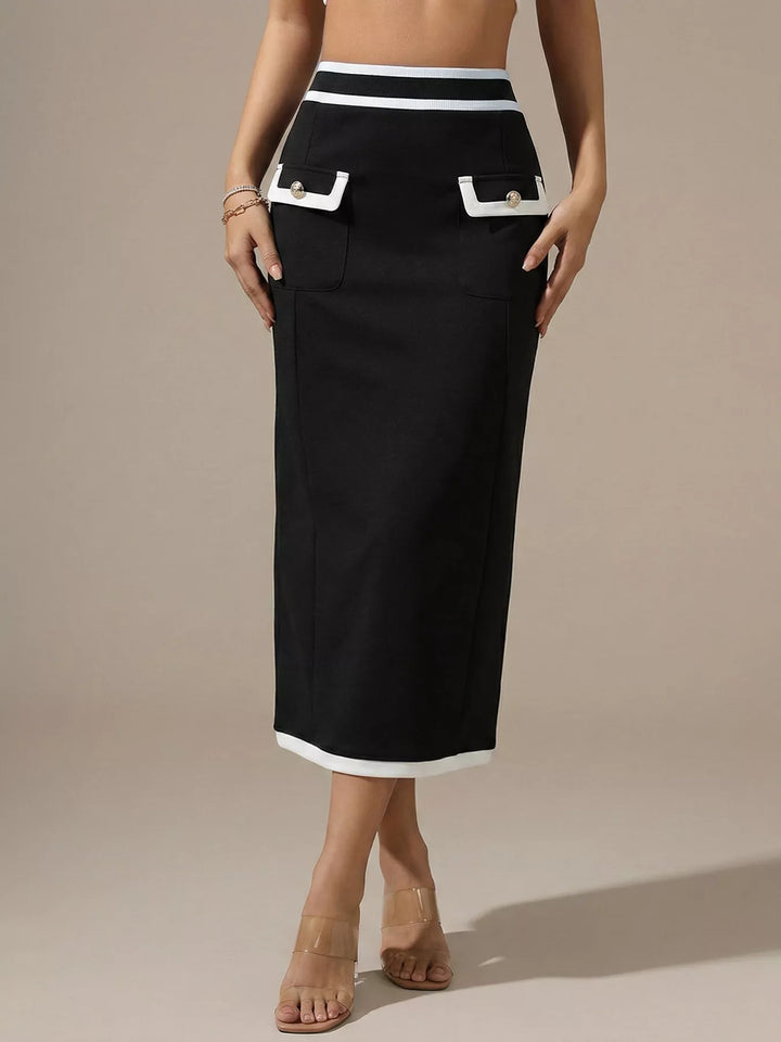 Women's midi skirt in black, high waisted pencil shape with white trim and front flap pockets
