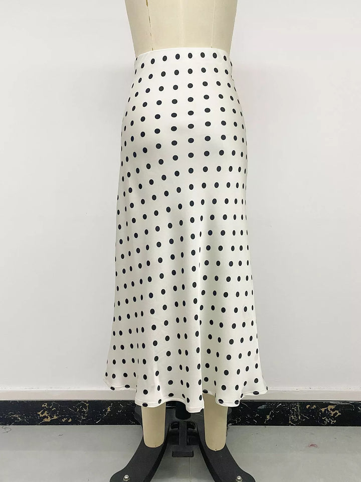 Cream polka dot midi skirt back view on a mannequin