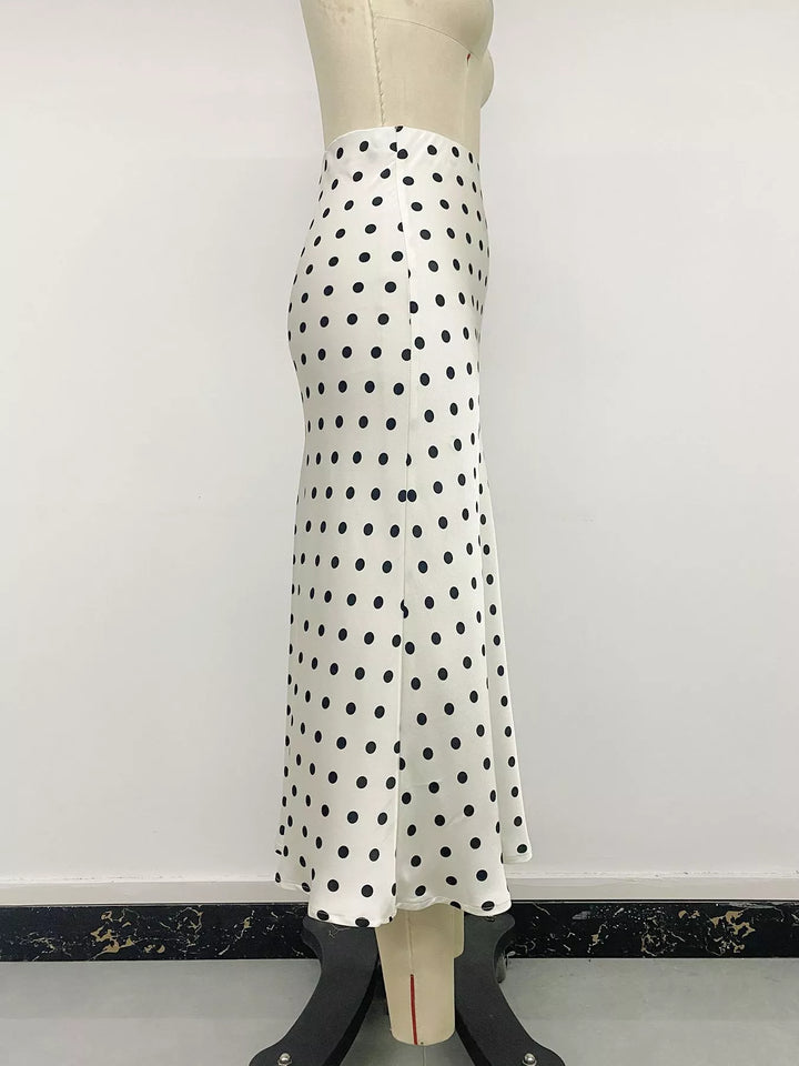 Cream polka dot midi skirt side view on a mannequin