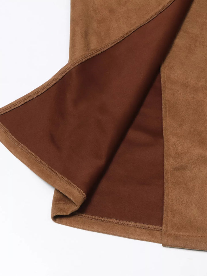 Inner lining and slit edge of the camel brown suede-look skirt
