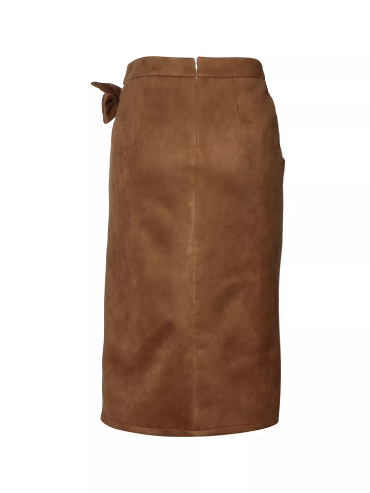 Side flat view of the camel brown midi skirt with the bow tie at the hip