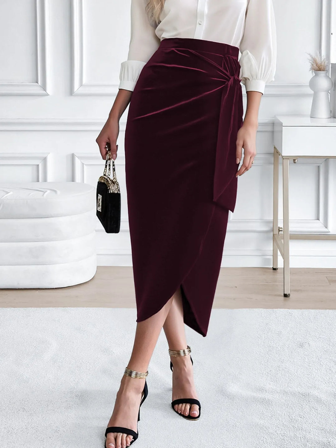 Burgundy wrap midi skirt with tulip hem, full length view with ankle strap heels