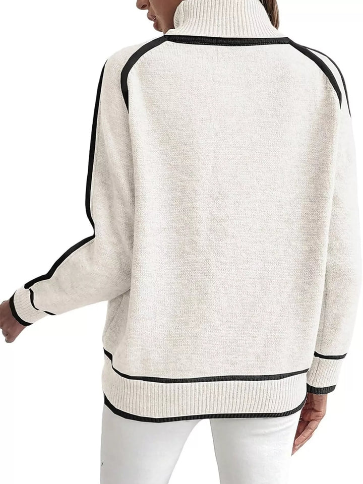 White mock neck sweater with black contrast piping, back view