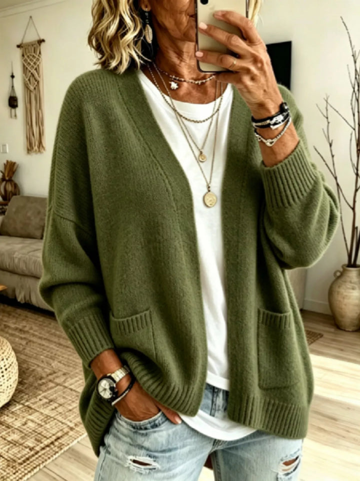 Olive green open front cardigan, oversized with V neck and front pockets