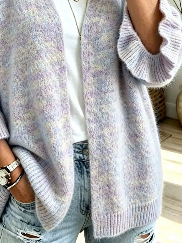 Close-up of the lavender cardigan ruffle cuff and soft knit texture