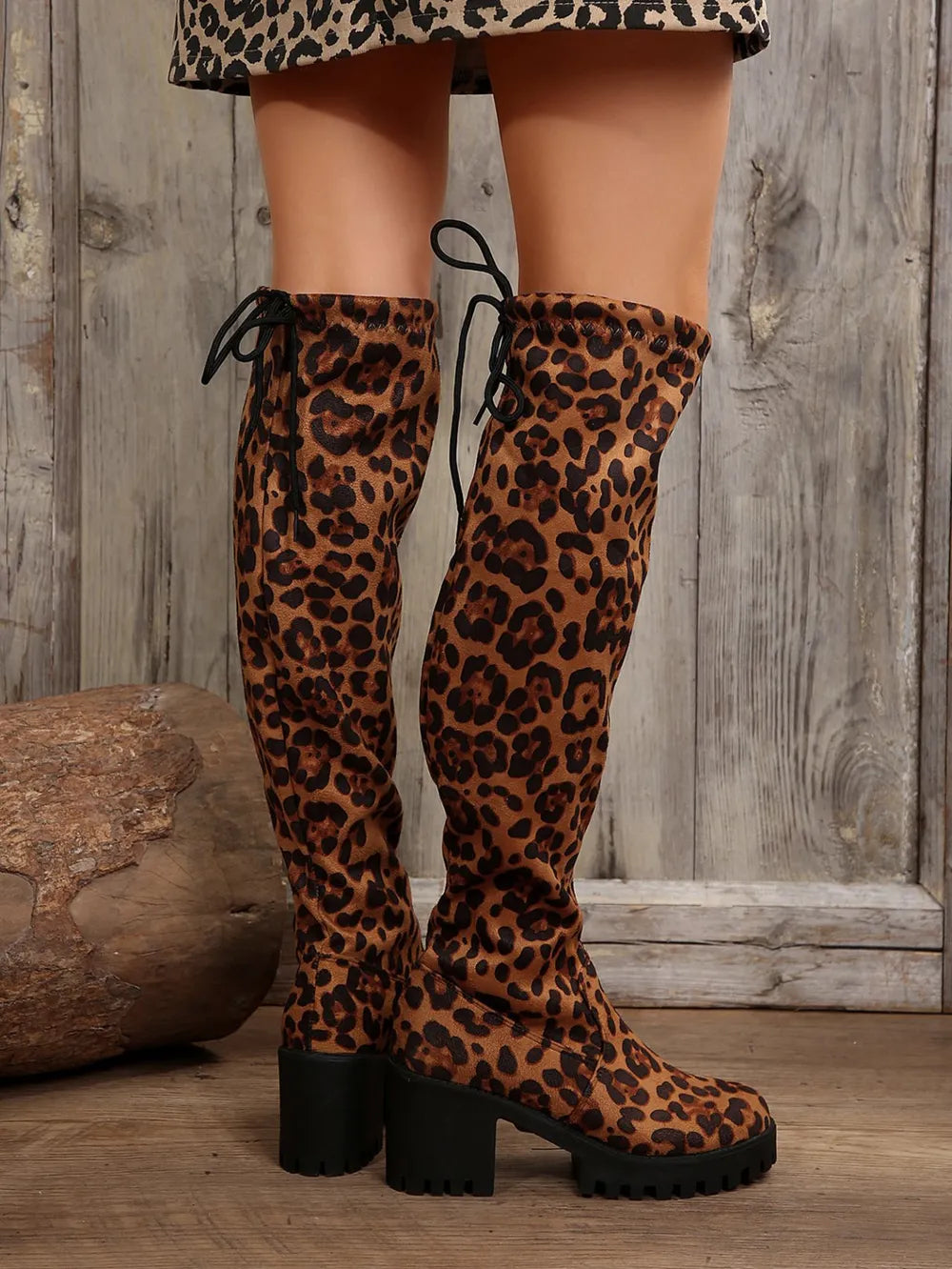 Back view of leopard over the knee boots showing the tie at the top