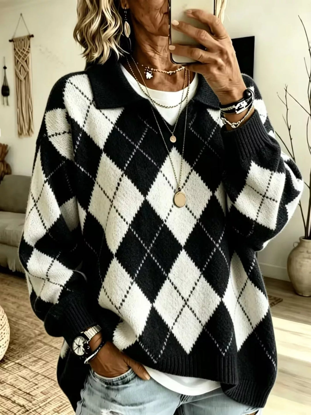 Women's black oversized sweater with argyle pattern and polo collar V placket