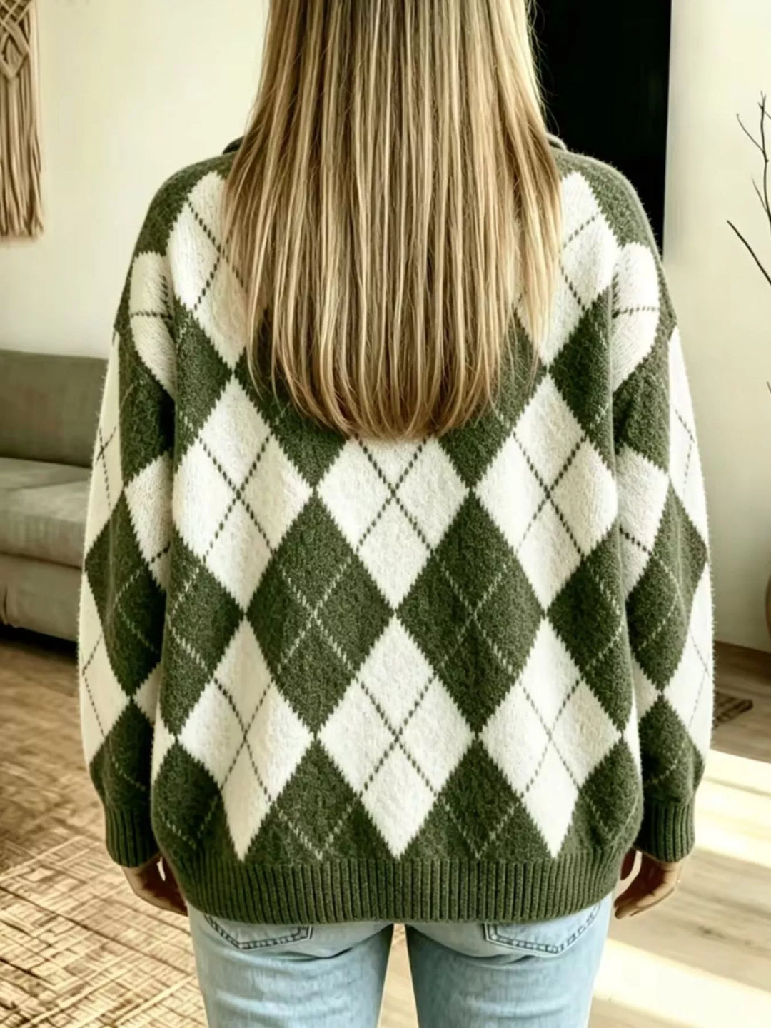 Back view of the olive green oversized argyle sweater