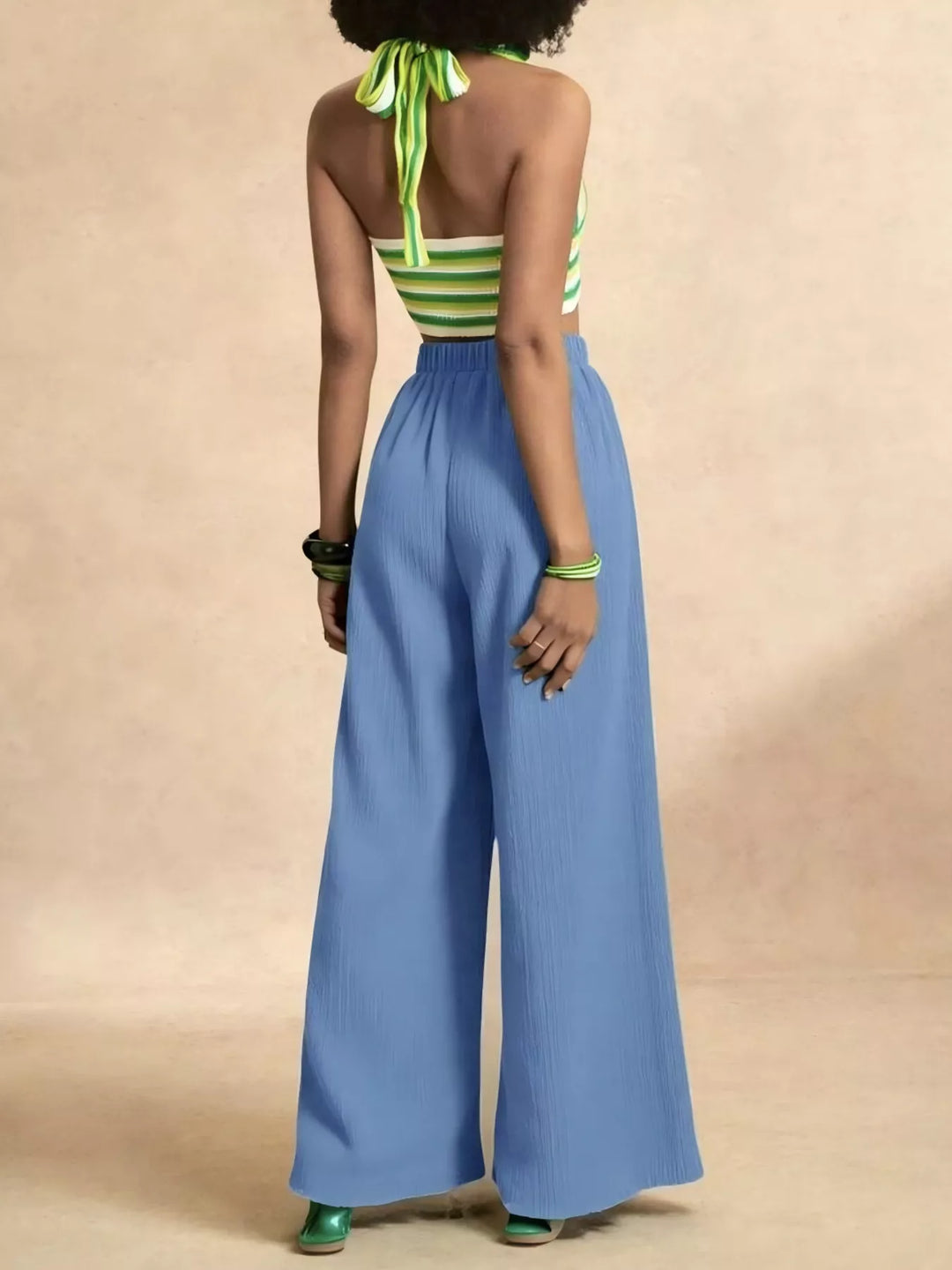 Back view of sky blue extra wide palazzo pants with elastic waist