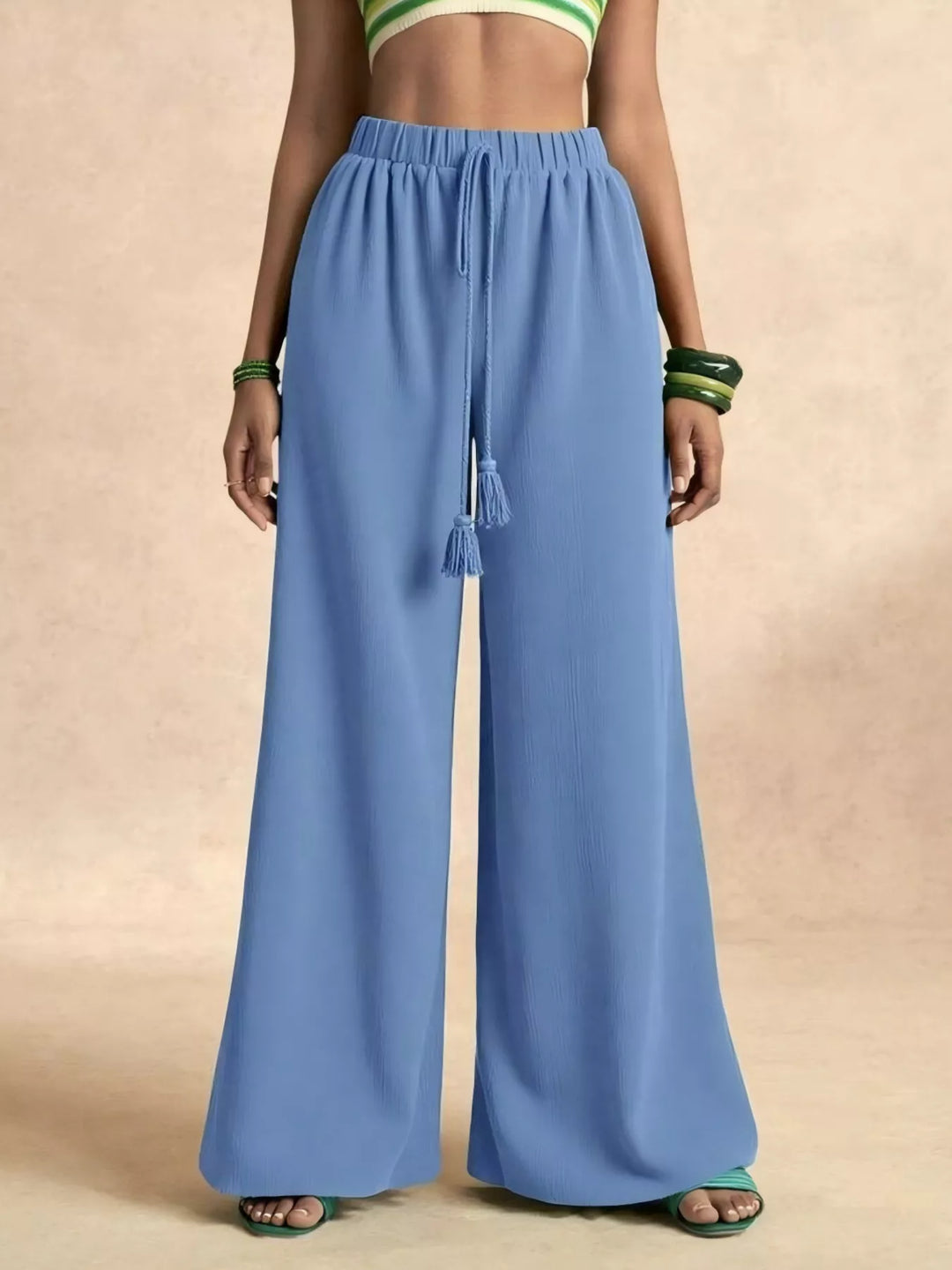 Sky blue palazzo pants, waist view showing the tassel drawstring